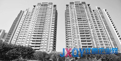 图为广州临江大道旁的一处新住宅楼。新华社记者 陈晔华摄