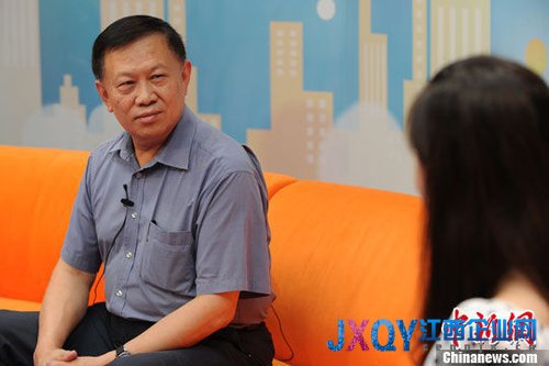 中国汽车流通协会有形汽车分会副会长 苏晖 （中新网 张龙云/摄）